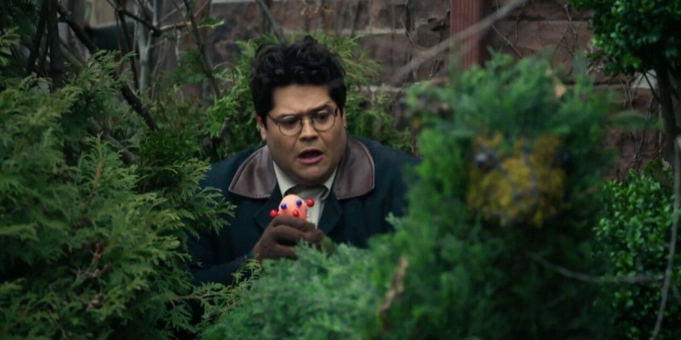 Guillermo hiding in bushes in What We Do in the Shadows.