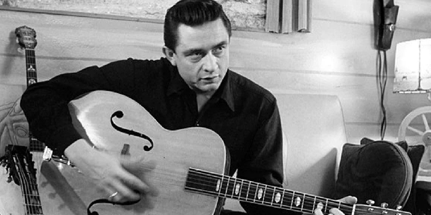 Johnny Cash playing the guitar