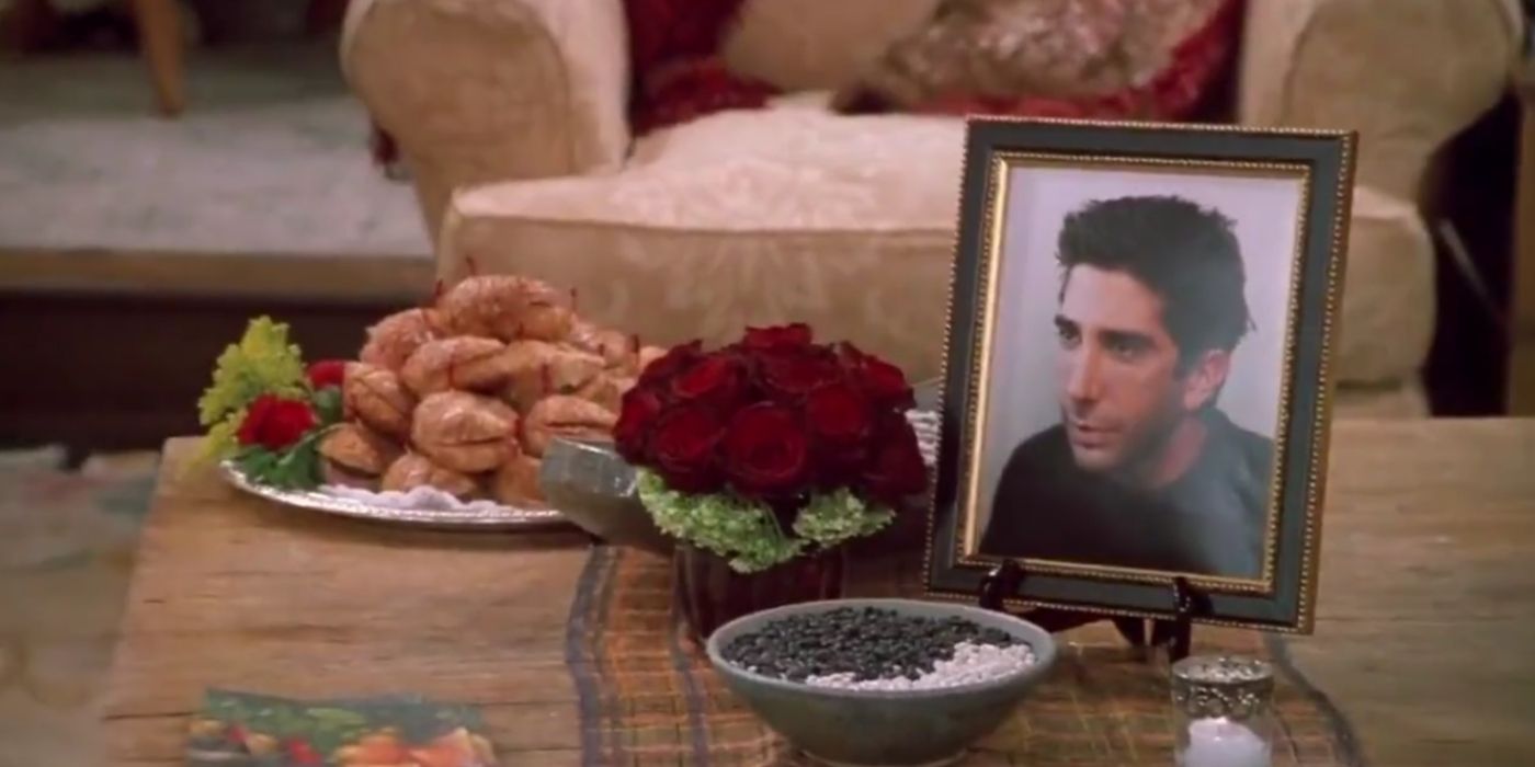 Ross' picture next to bowls of food during his fake memorial service in Friends