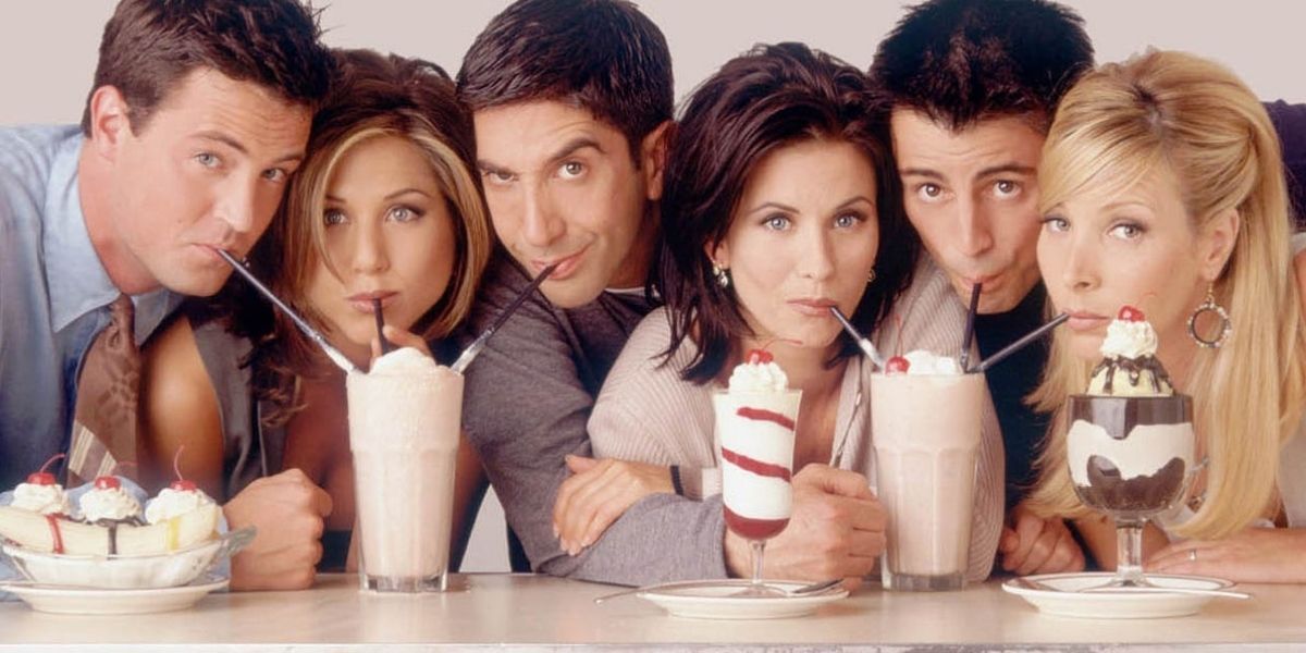 The Friends cast sharing milkshake in a promo image