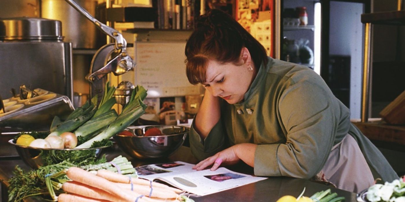 Sookie looking at a recipe in the kitchen on Gilmore Girls
