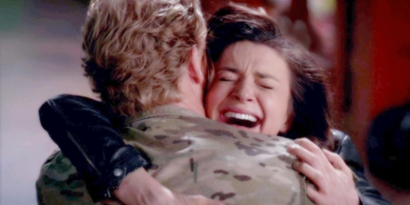 Owen hugging a crying Amelia after Derek's death on Grey's Anatomy