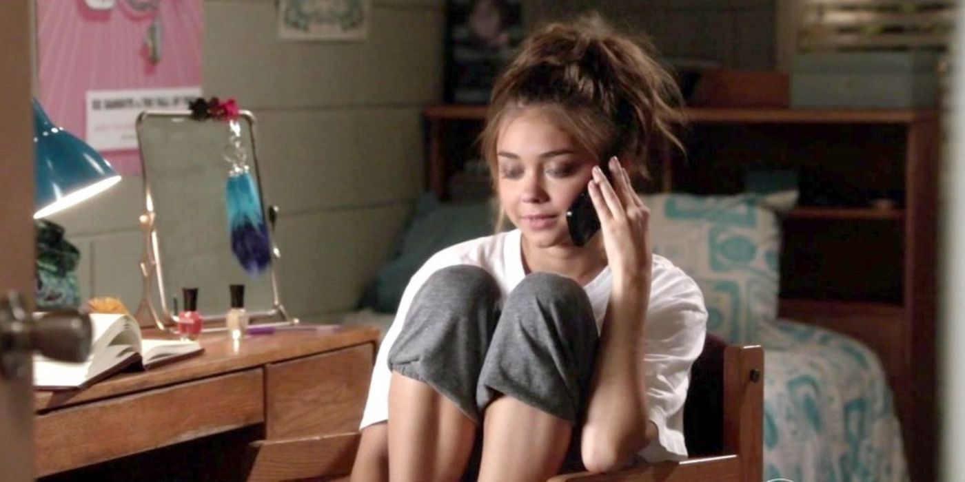 Haley in her dorm room on her phone on Modern Family