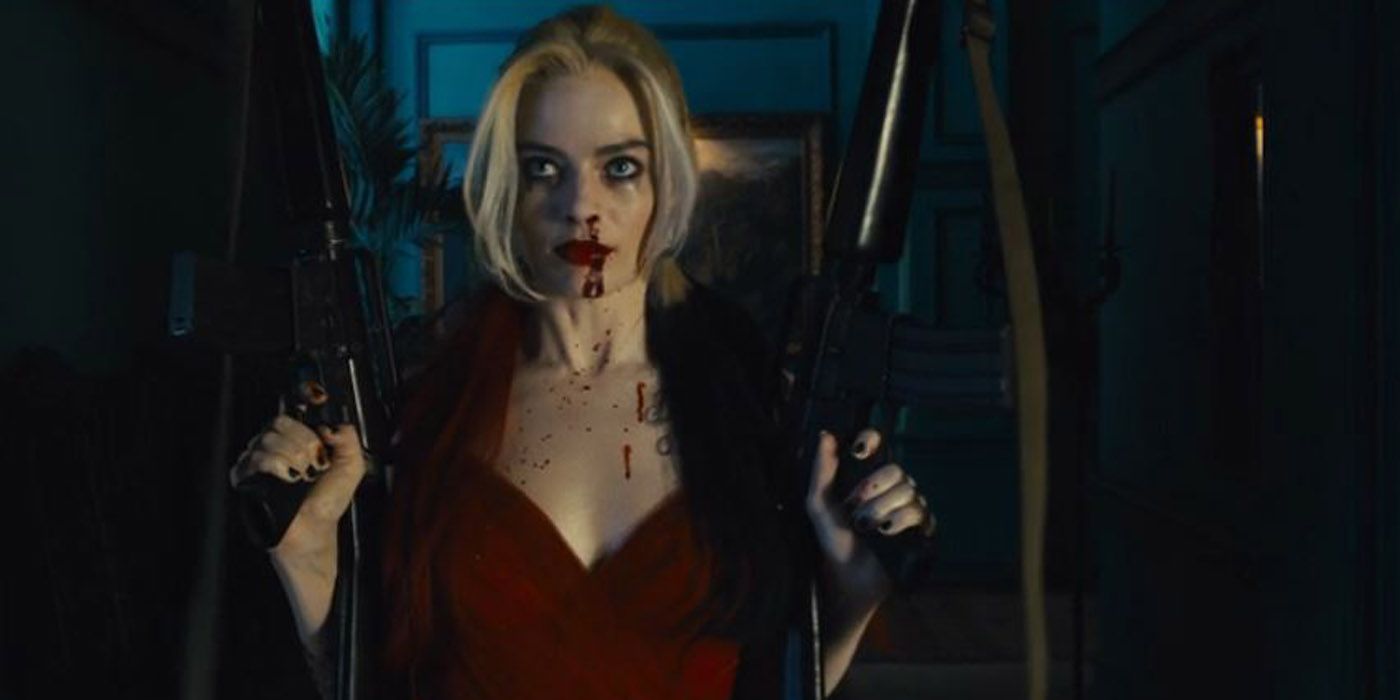 Harley Quinn holding two big guns in The Suicide Squad.