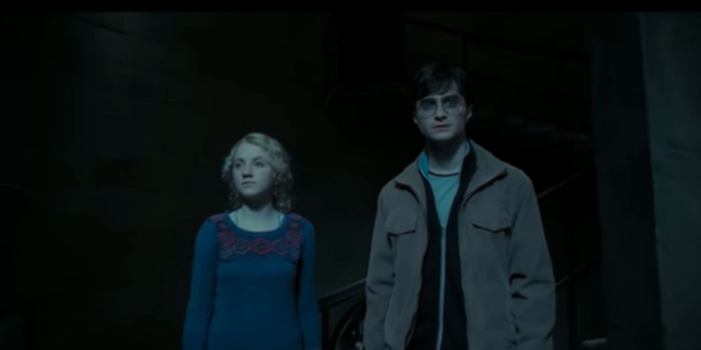 Luna and Harry staring out the window during the Battle of Hogwarts in Harry Potter and the Deathly Hallows Part 2