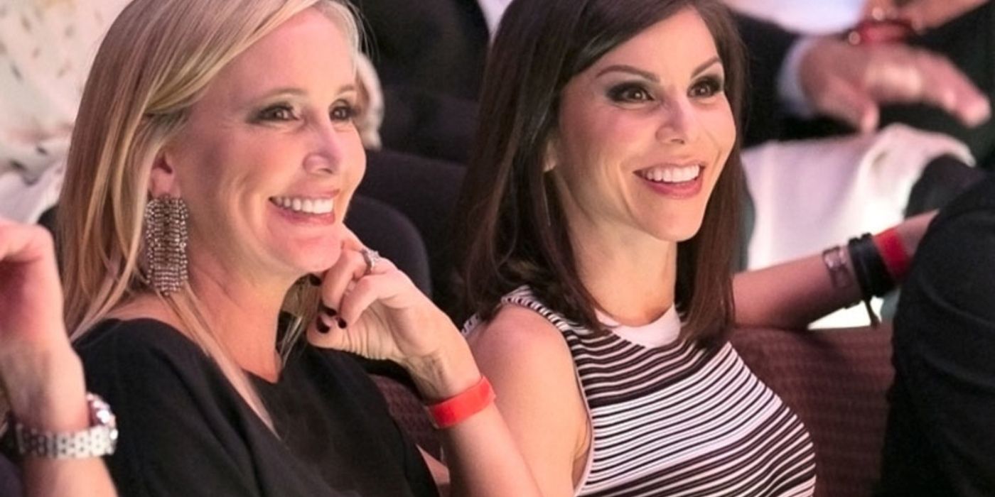 Shannon and Heather laughing and sitting together on The Real Housewives Of Orange County