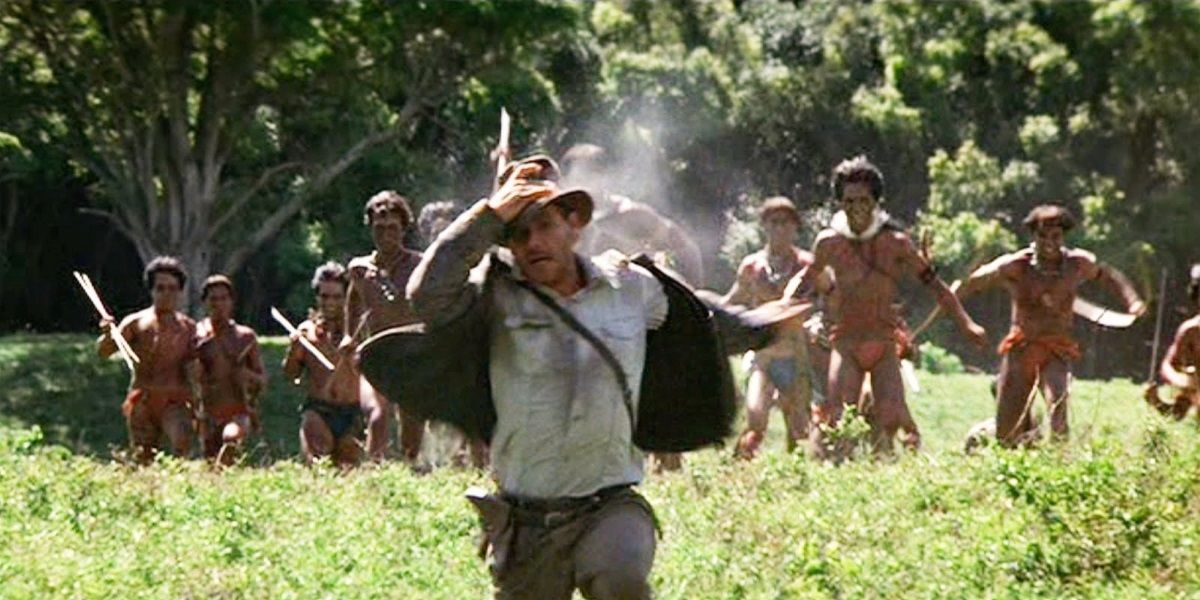 Indiana Jones fleeing from a tribe in Raiders of the Lost Ark.