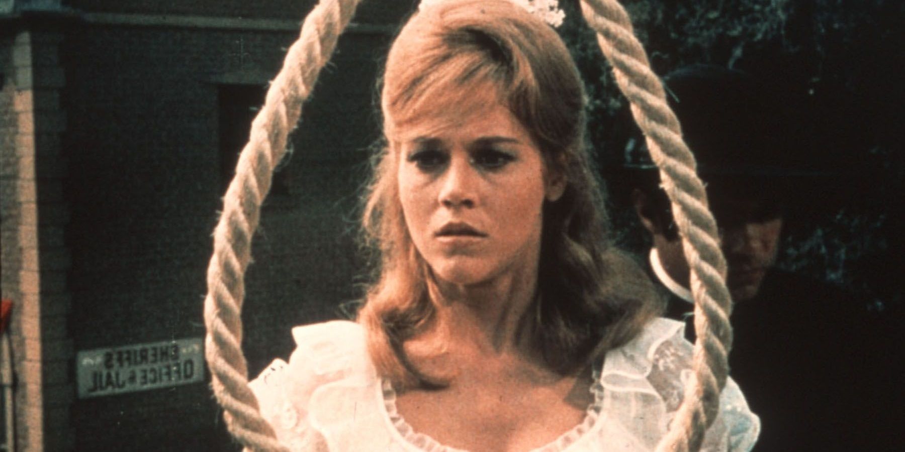 Cat Ballou looks at a noose