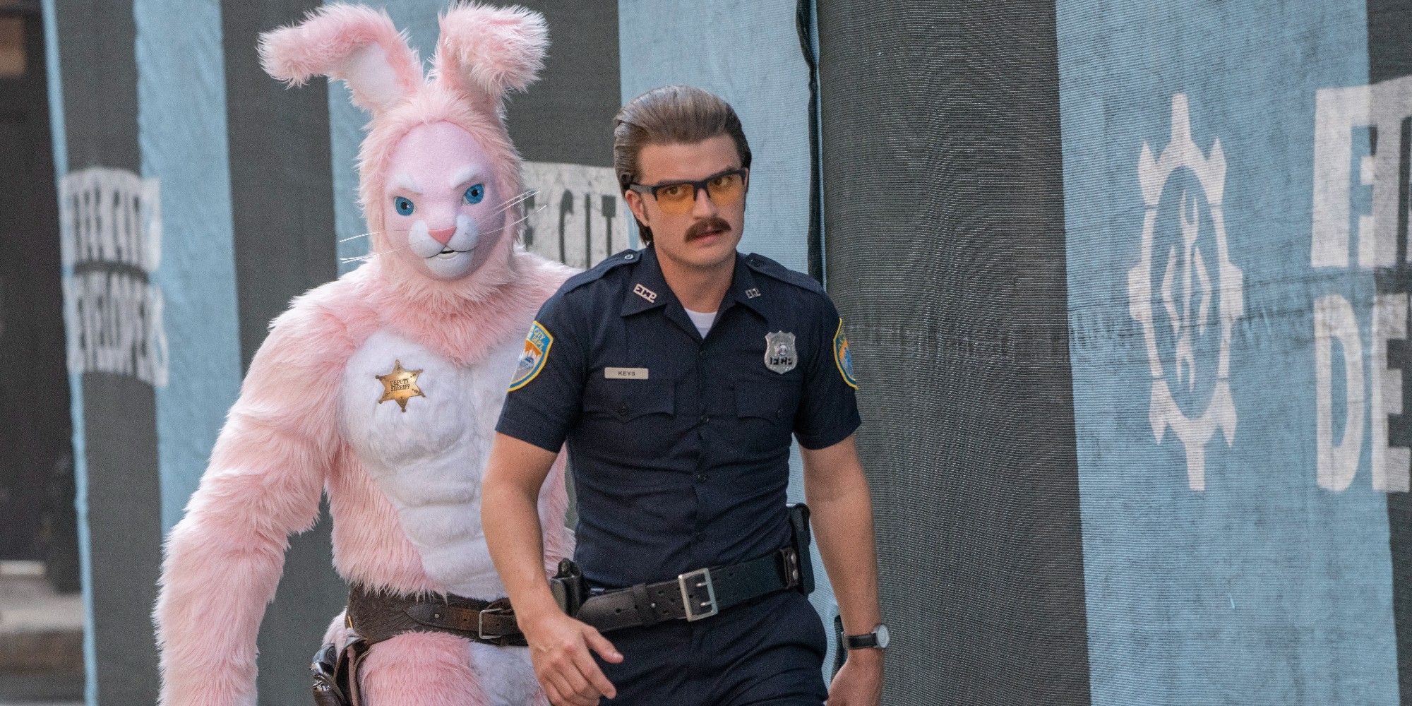 Joe Keery and Mouser in a bunny costume in Free Guy