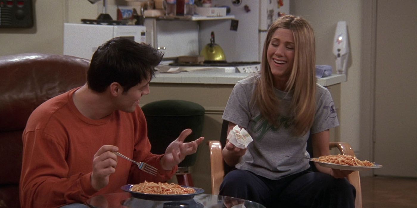 Joey and Rachel eat spaghetti in Friends