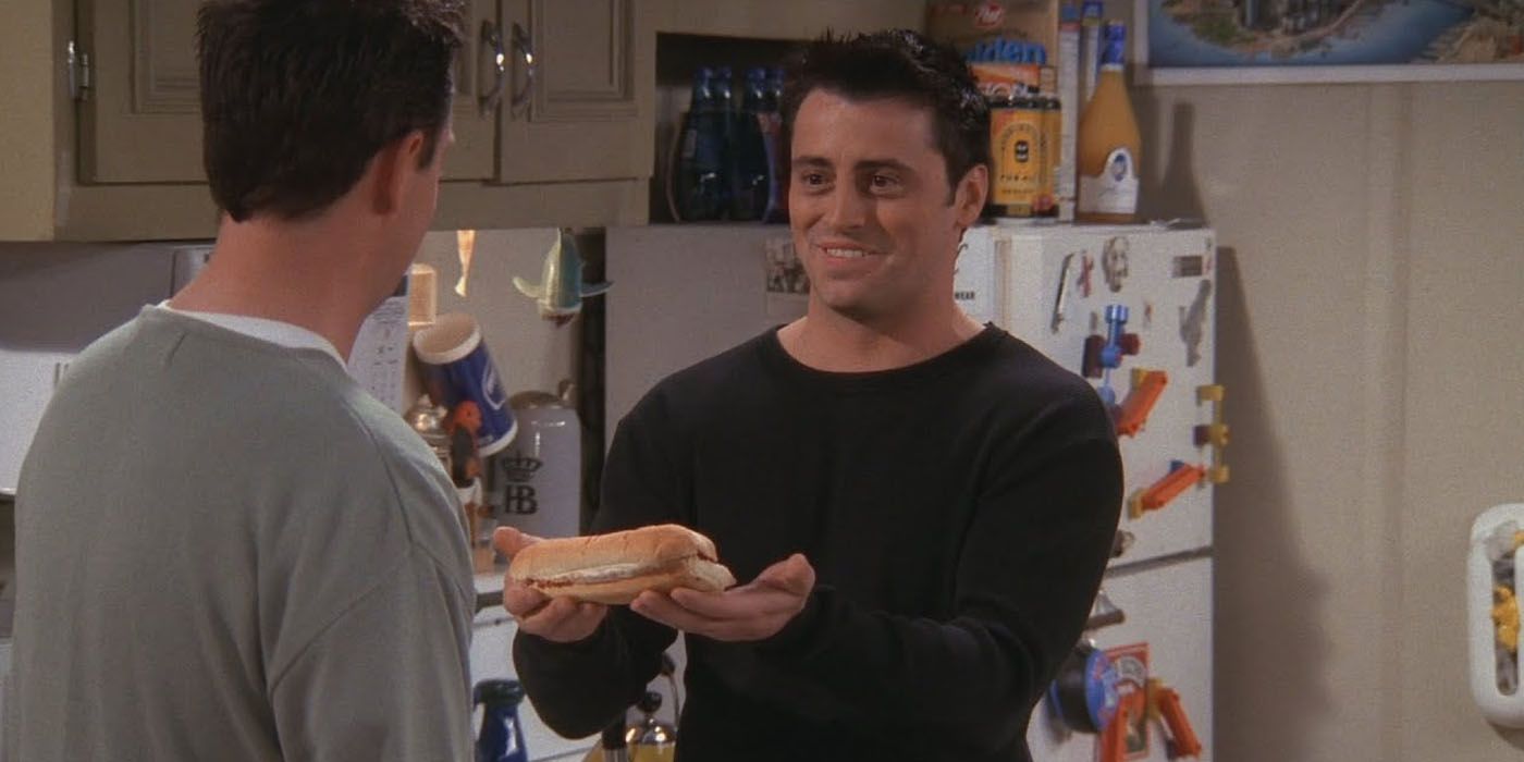 Joey offers Chandler a bite of his sandwich in Friends.