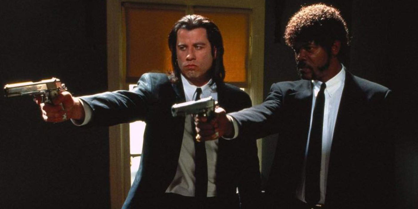 Jules and Vincent pointing guns at someone in Pulp Fiction.