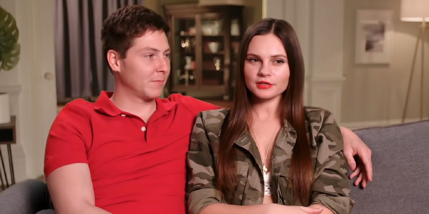 Julia Trubkina and Brandon Gibbs from 90 Day Fiancé season 8, sitting on the couch