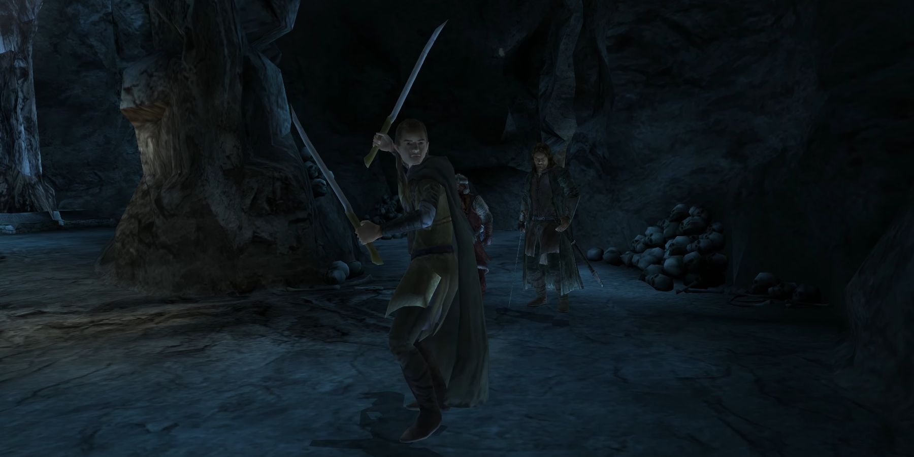 Legolas, Gimli, and Aragorn in the caverns beneath the Dwimorberg in The Lord Of The Rings: The Return Of The King