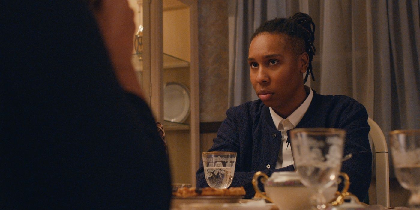 Lena Waithe sitting at a table in Master of None.