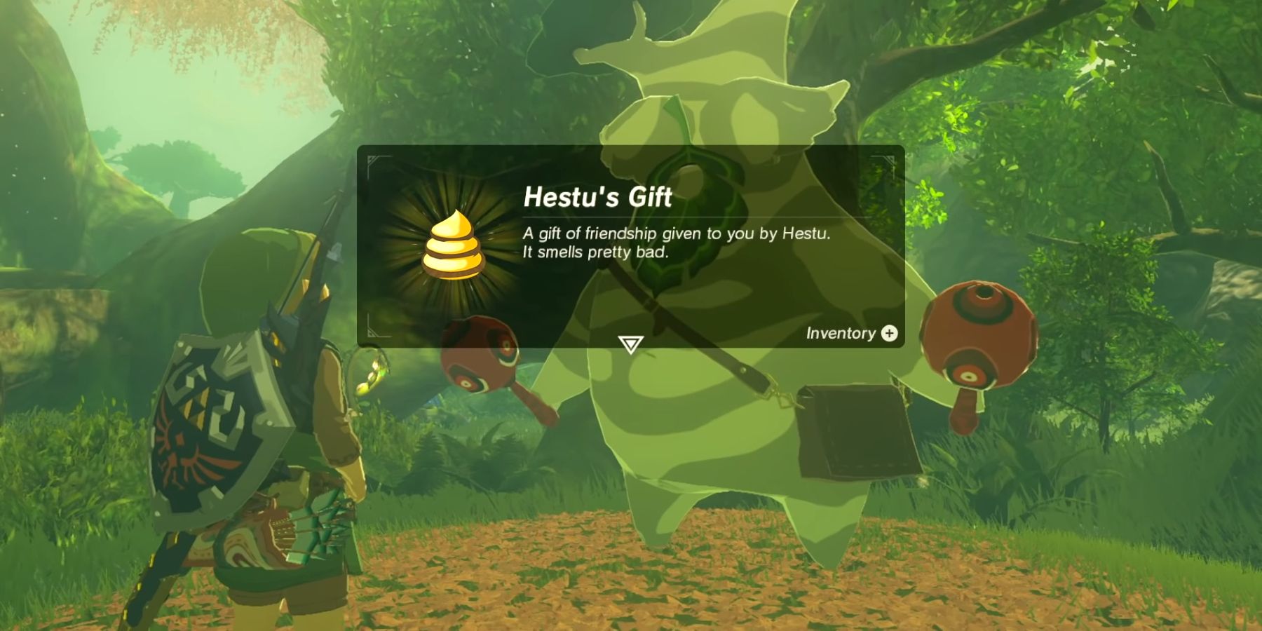 Link being given Hestu's Gift in The Legend Of Zelda: Breath Of The Wild which resembles a pile of poop