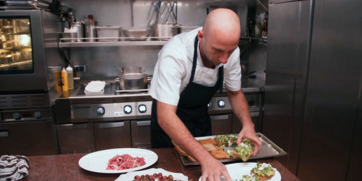 Matthew Shea from Below Deck Med cooking in the kitchen