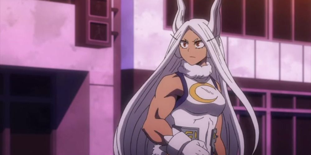 Mirko from My Hero Academia flexing her arm and looking serious