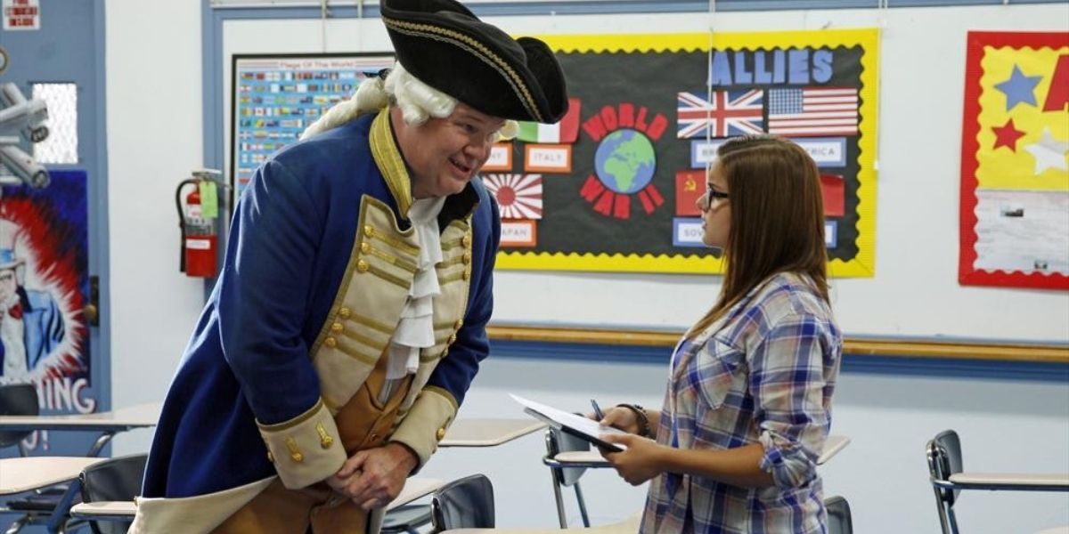 Cam dressed as George Washington in Alex's class in Modern Family.