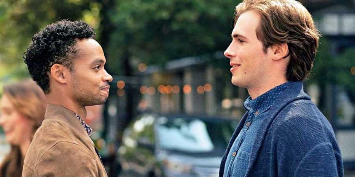 Two men smile at each other on the street in Modern Love season 2.