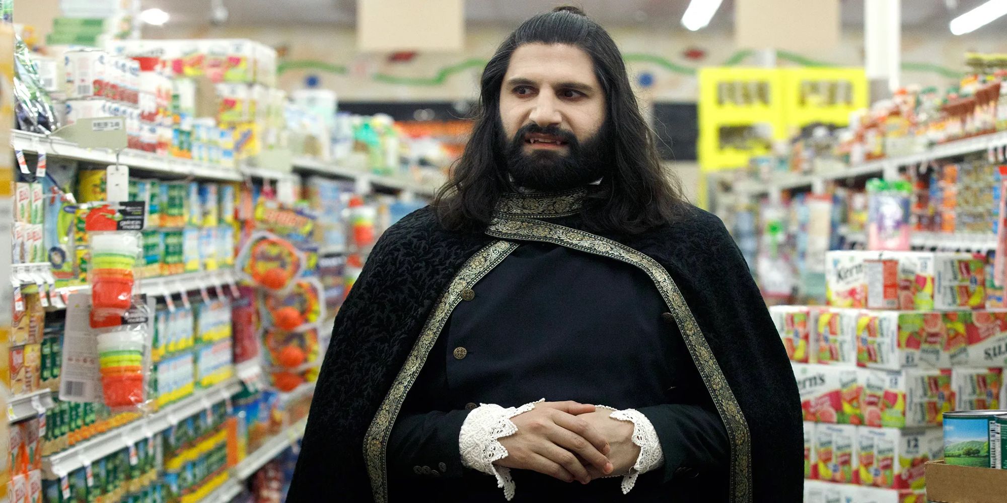 Nandor walks through a grocery store aisle in What We Do in the Shadows.