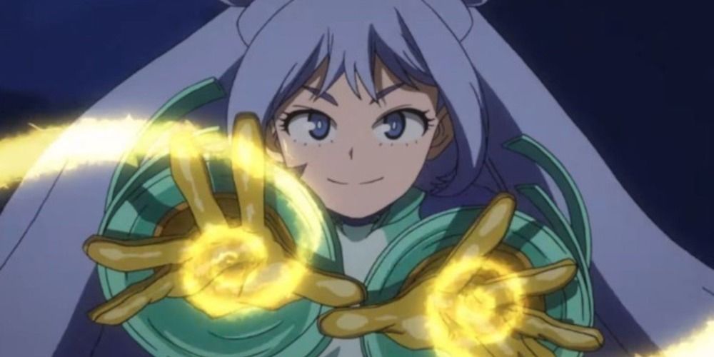Nejire Hado from My Hero Academia smiling and activating her yellow spiral quirk from her hands