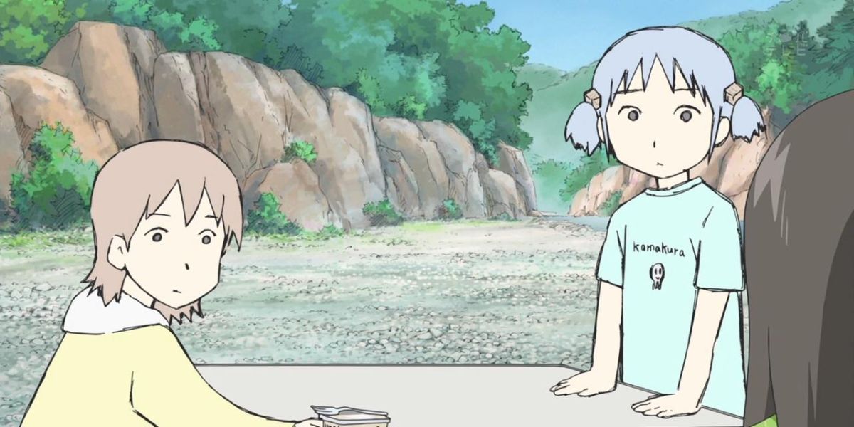 A comical reaction from Mio and Yuuko in Nichijou.