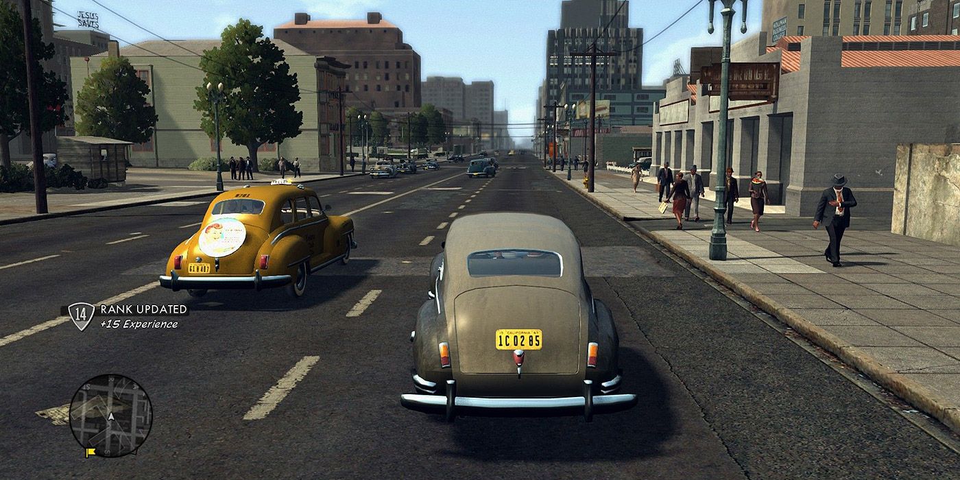 A classic car driving down an L.A. street in L.A. Noire