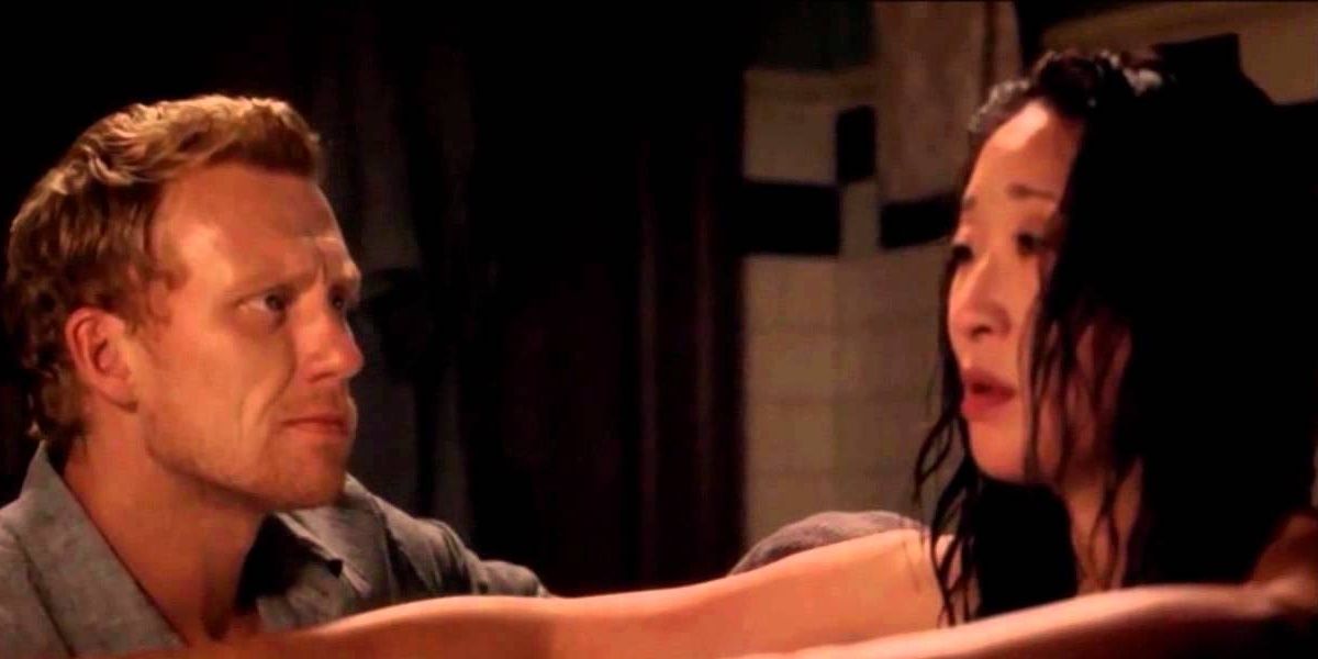Owen looking at Cristina as she sits in bath on Greys Anatomy