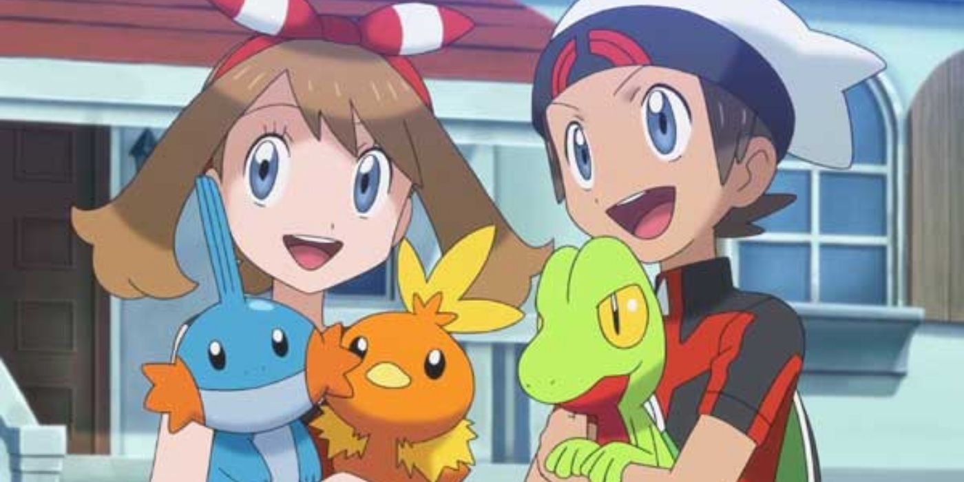 Brendan and May holding the Hoenn Starters in the Pokémon anime.