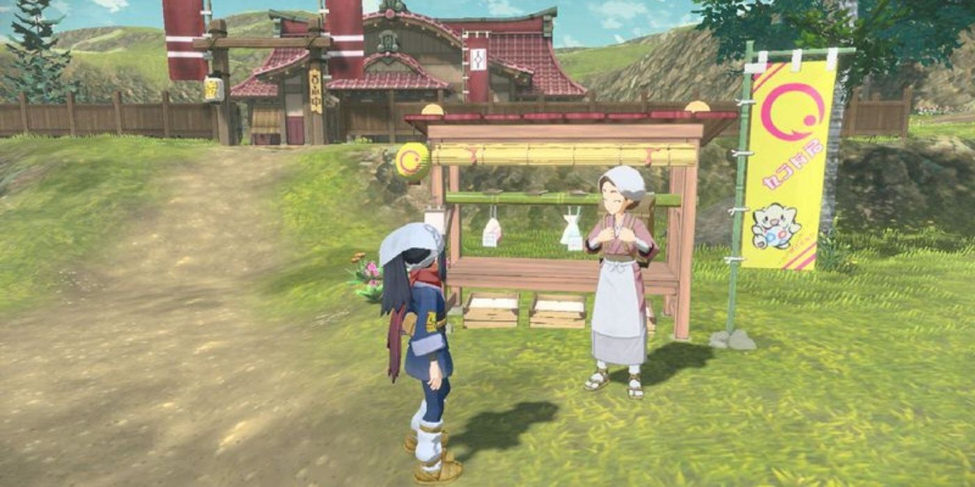 Rei talks to an NPC in Pokémon Legends: Arceus