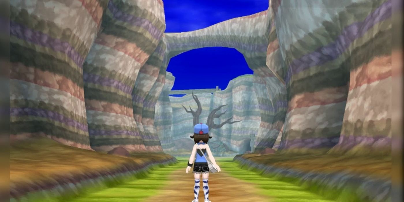 The player's character standing in the Vast Poni Canyon in Pokémon Sun &amp; Moon