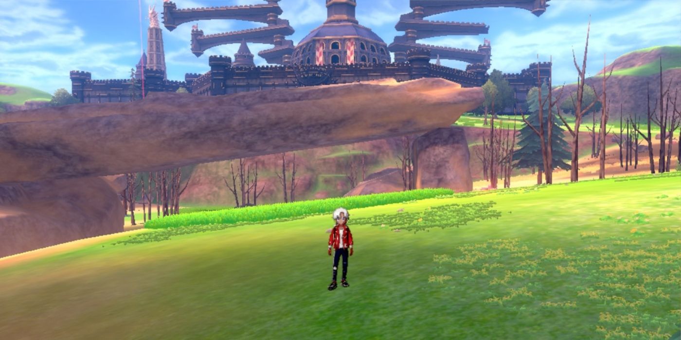 Victor at Dusty Bowl with Motostoke in the distance in Pokémon Sword &amp; Shield