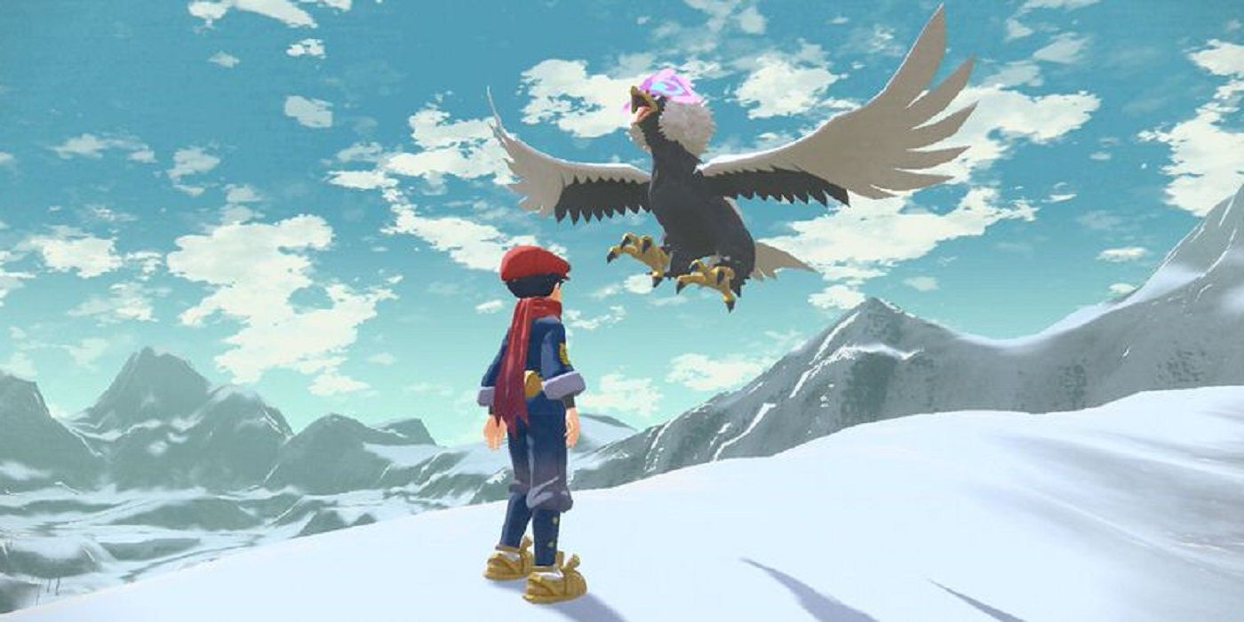 A trainer standing next to Hisuian Braviary in Pokémon Legends: Arceus