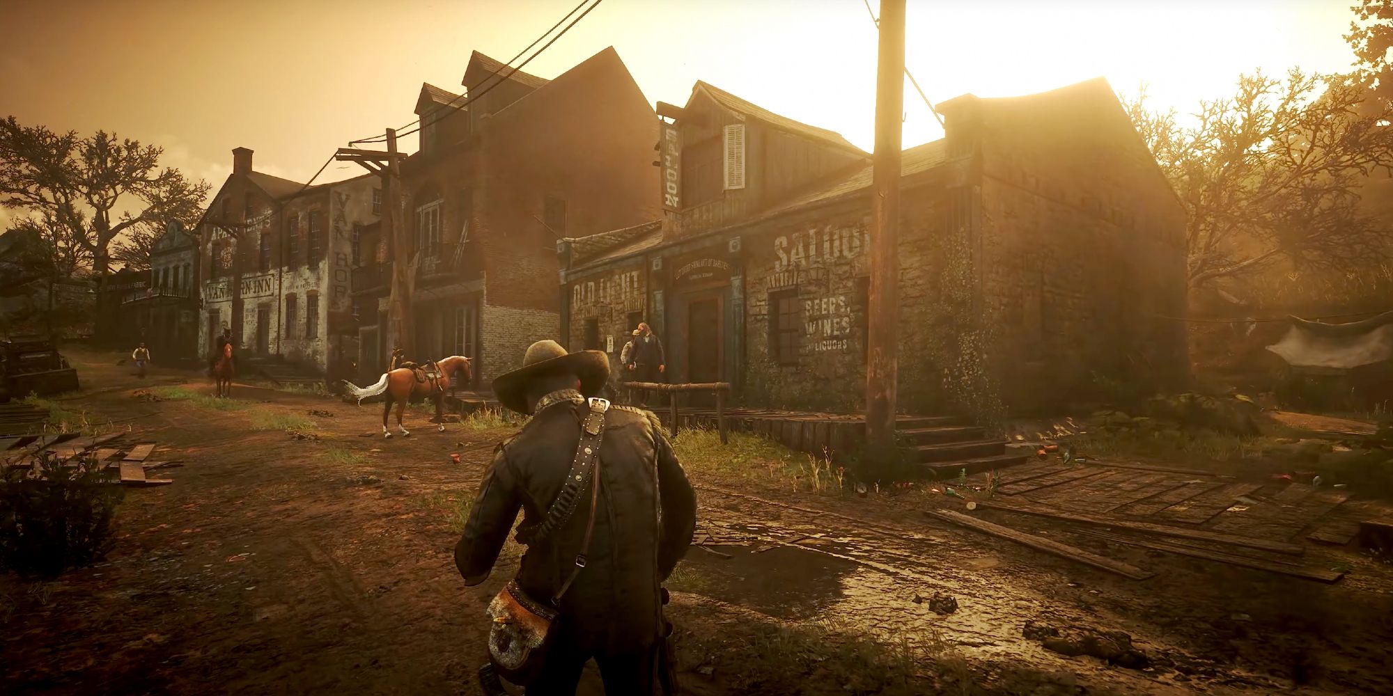 Arthur walking toward his horse in Van Horn in Red Dead Redemption 2.