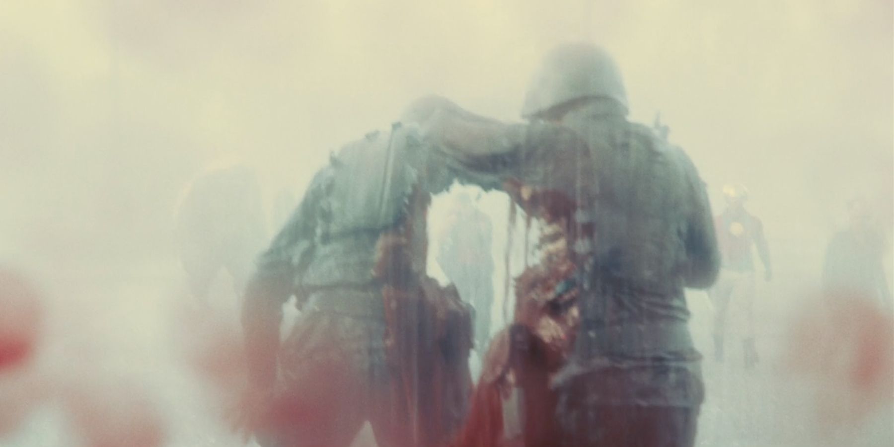 Rick Flag shooting out the sides of two soldiers in James Gunn's The Suicide Squad