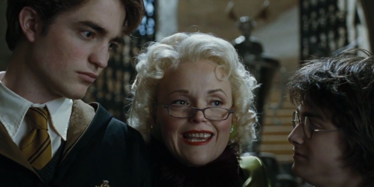 Rita Skeeter with Cedric Diggory and Harry Potter