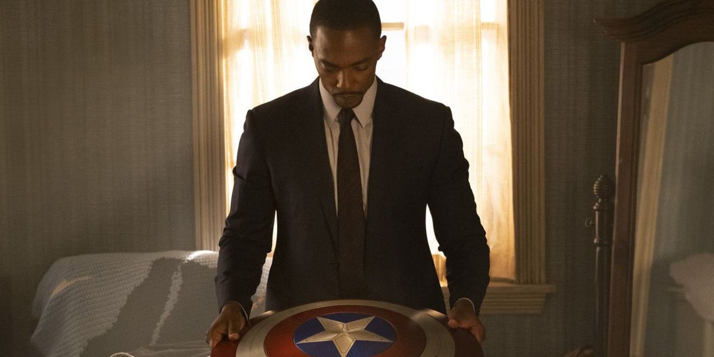Sam looks at cap's shield in Falcon and the Winter Soldier