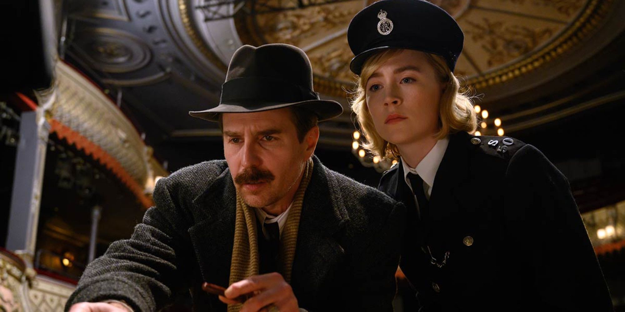Sam Rockwell as Inspector Stoppard and Saoirse Ronan as Constable Stalker in See How They Run