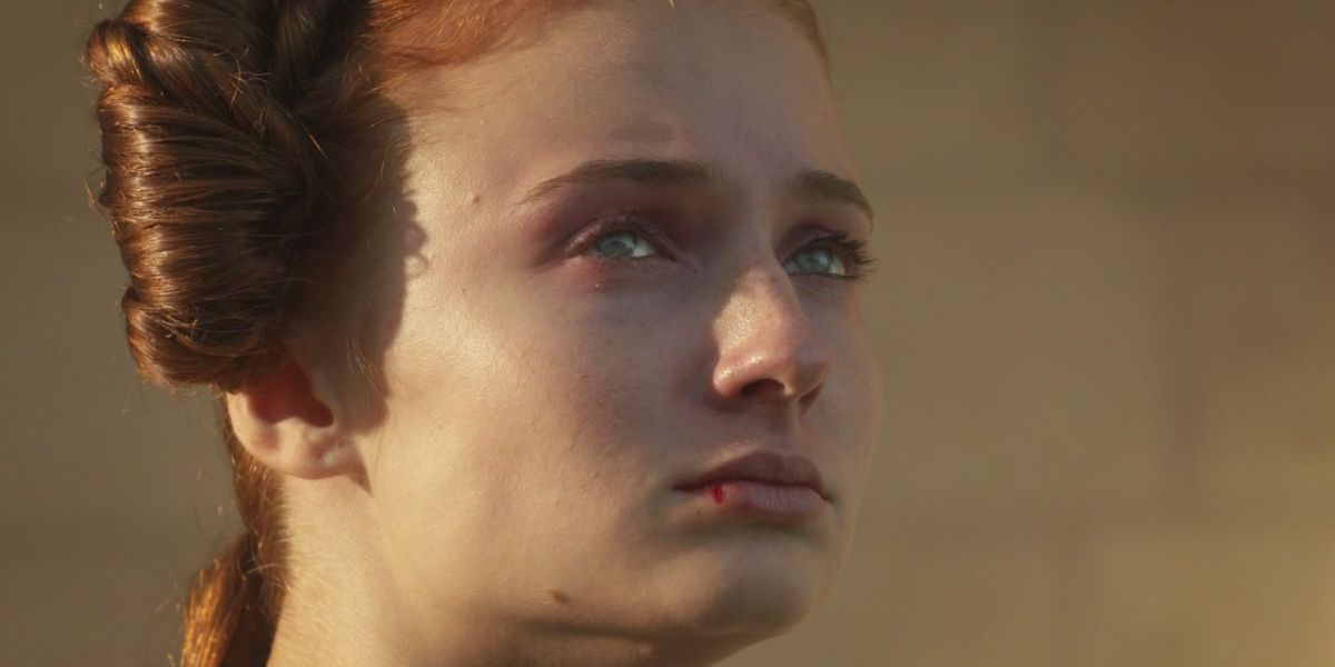Sansa looking up at Ned&rsquo;s severed head on Game of Thrones