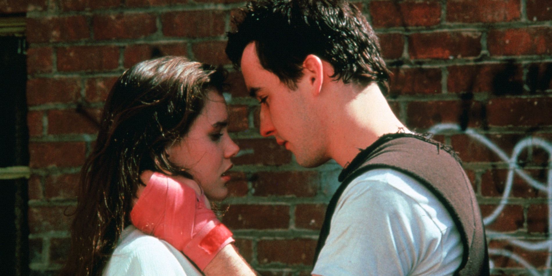 Lloyd is about to kiss Diane in the 1989 film Say Anything...