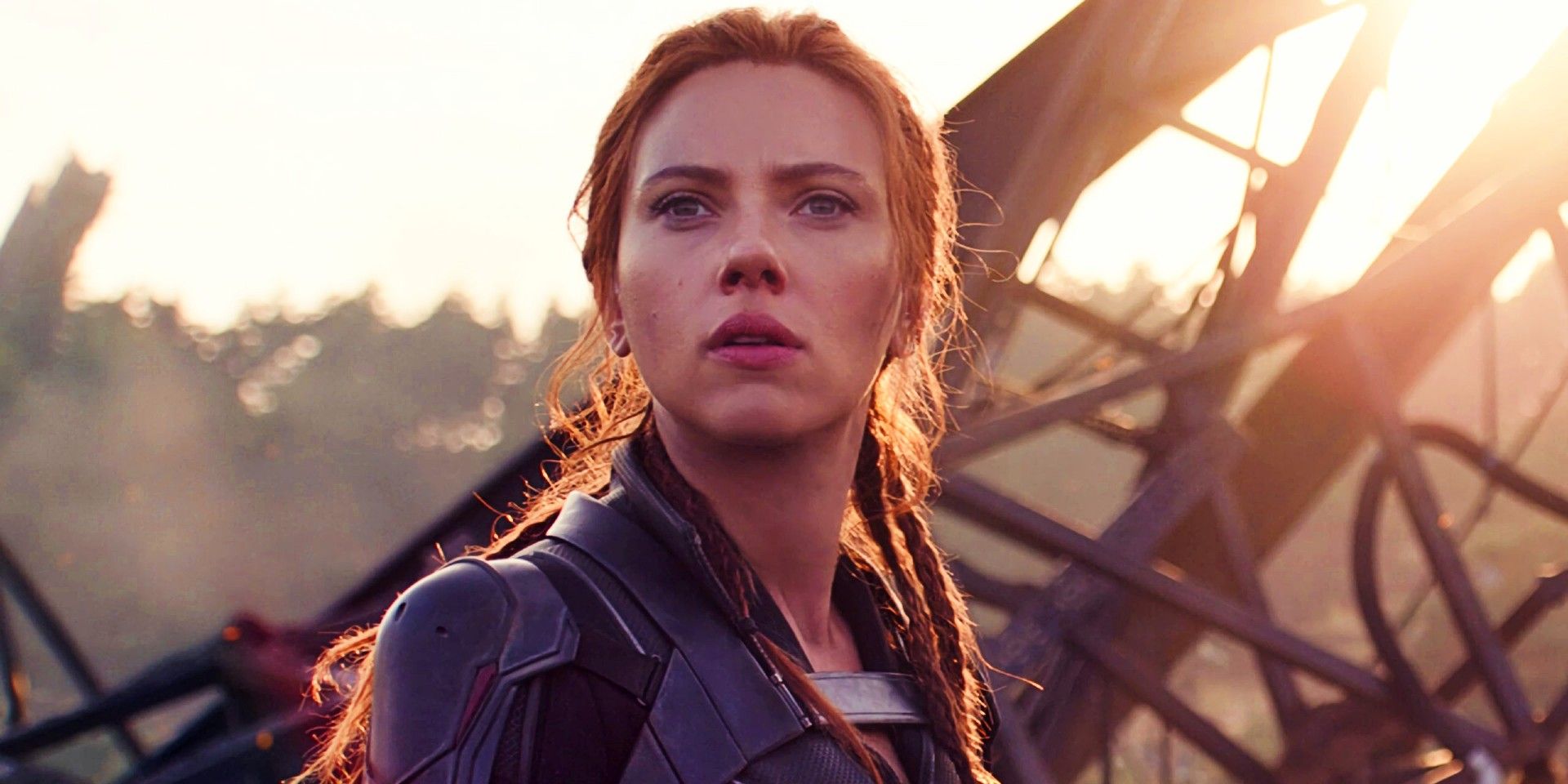 Natasha standing among the wreckage in Black Widow