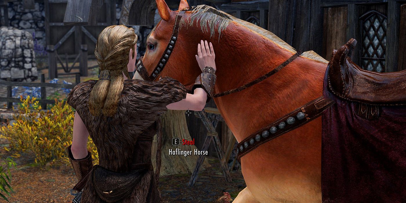 A character petting a horse in Skyrim