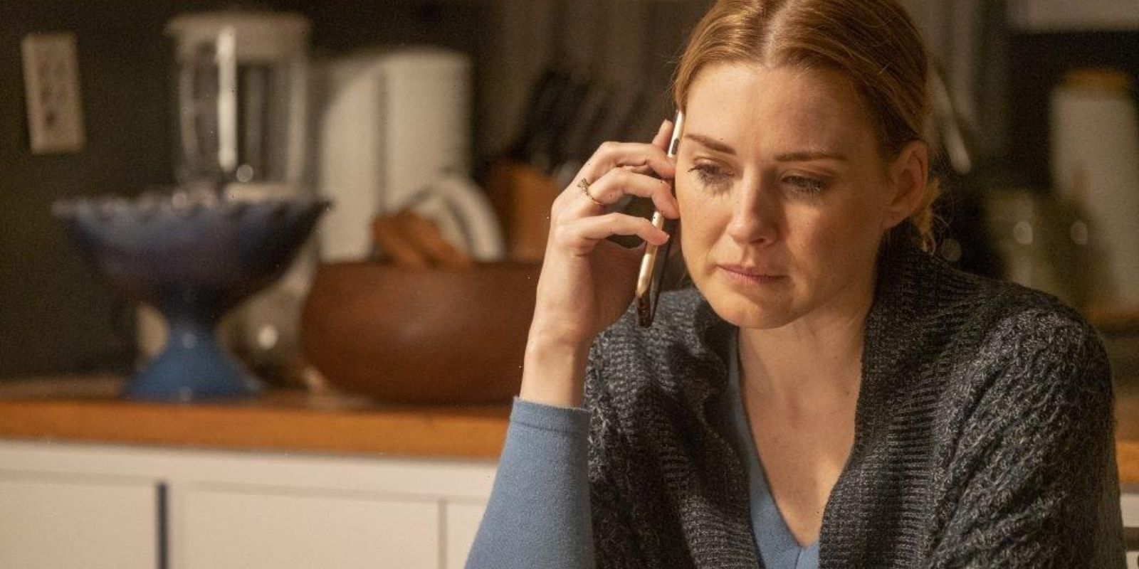 Sophie looks wistful on the phone with Kevin Pearson in This Is Us.