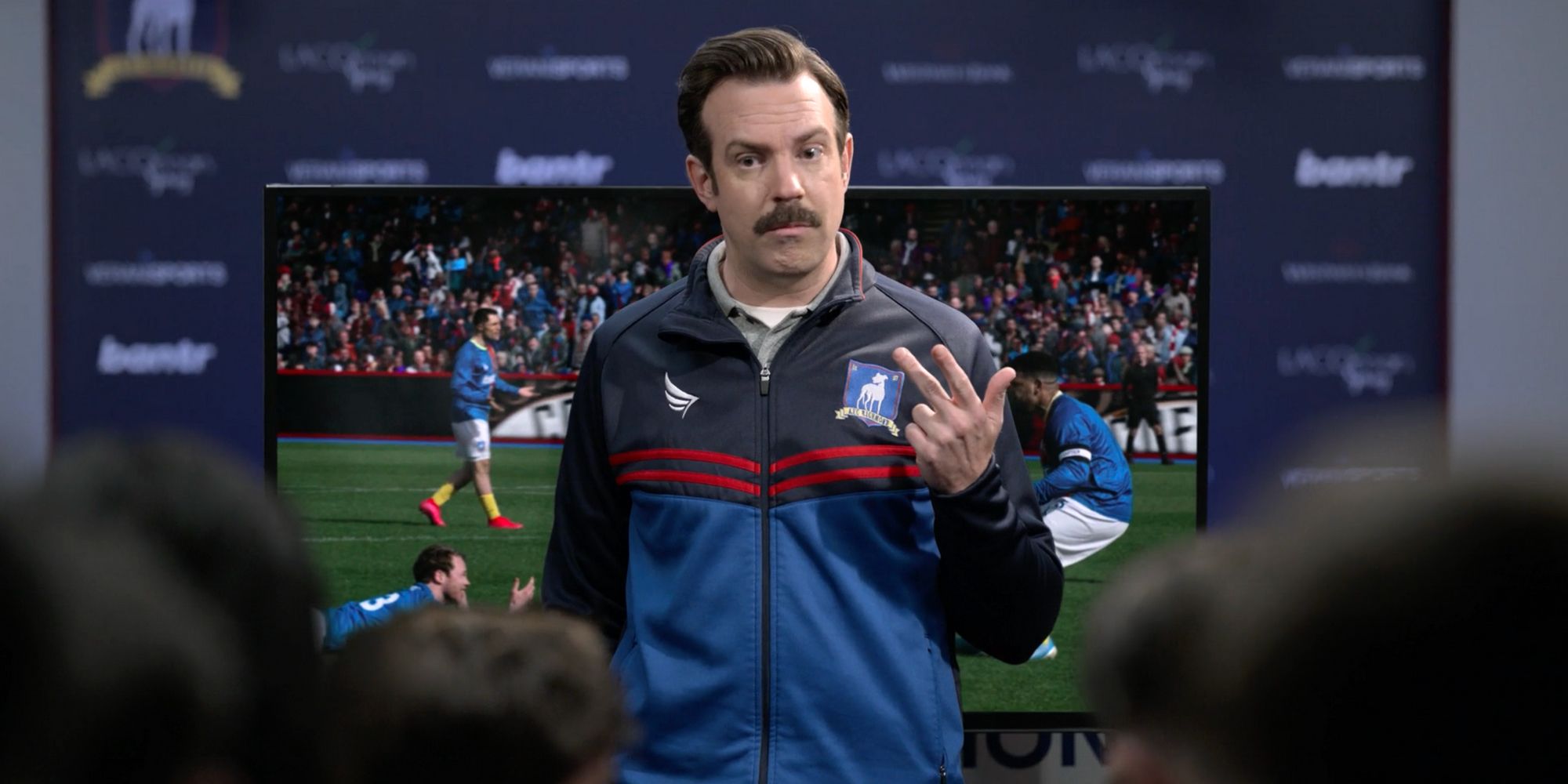 Ted Lasso talking to his players