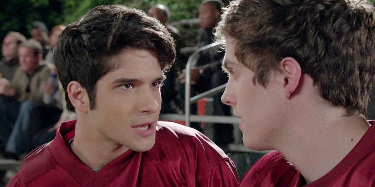 Scott looks at Isaac in the grandstands during a lacrosse game in Teen Wolf