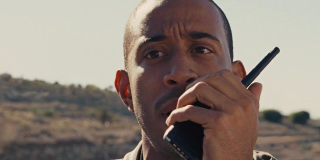 Tej warns his crew at the NATO base after he spots Owen Shaw commandeering a tank in Furious 6