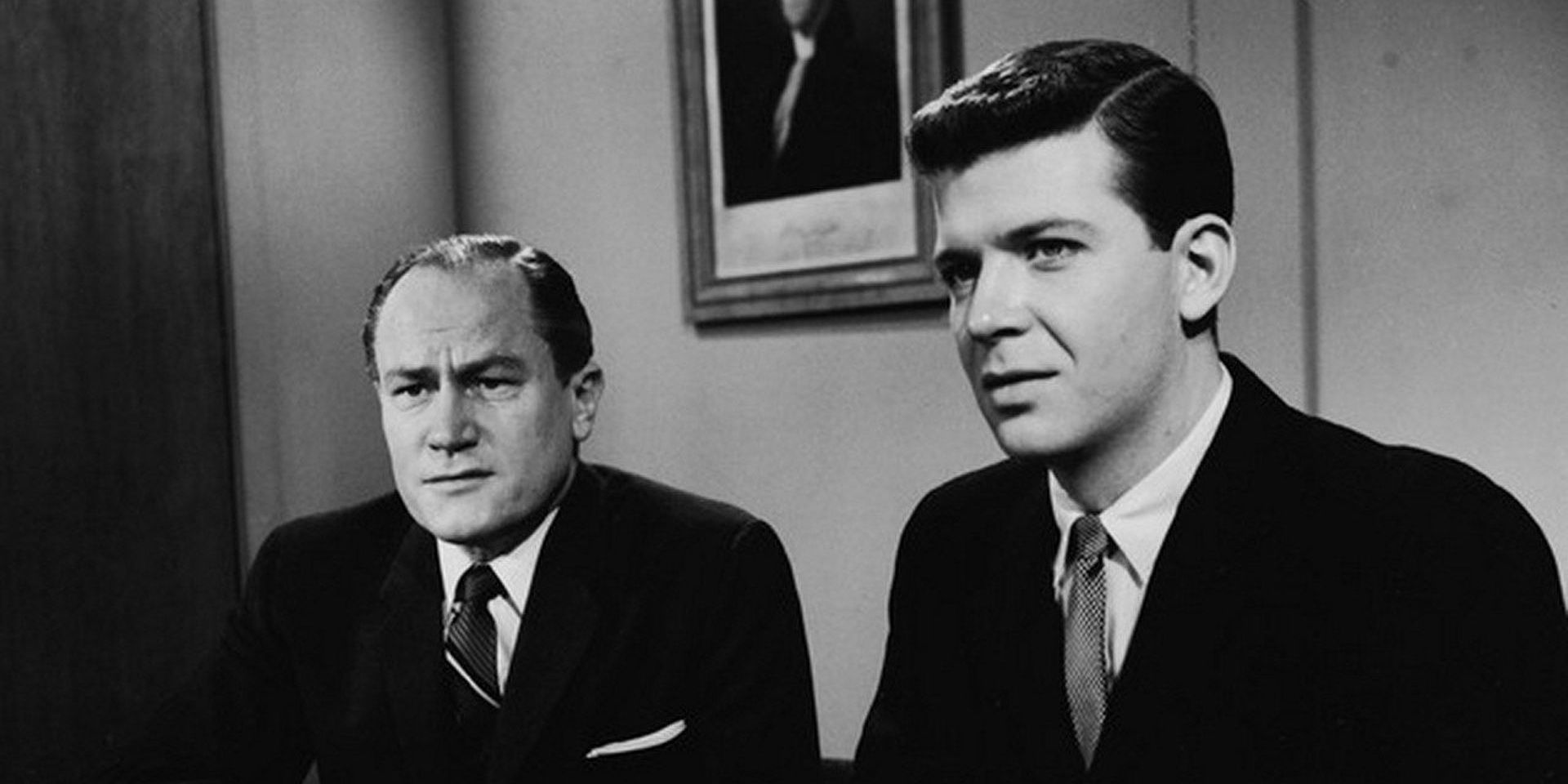 Two men wearing suits in a black and white image from The Defenders
