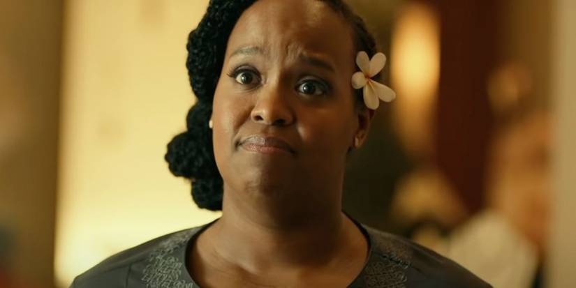 Belinda raising her eyebrows in surprise in The White Lotus