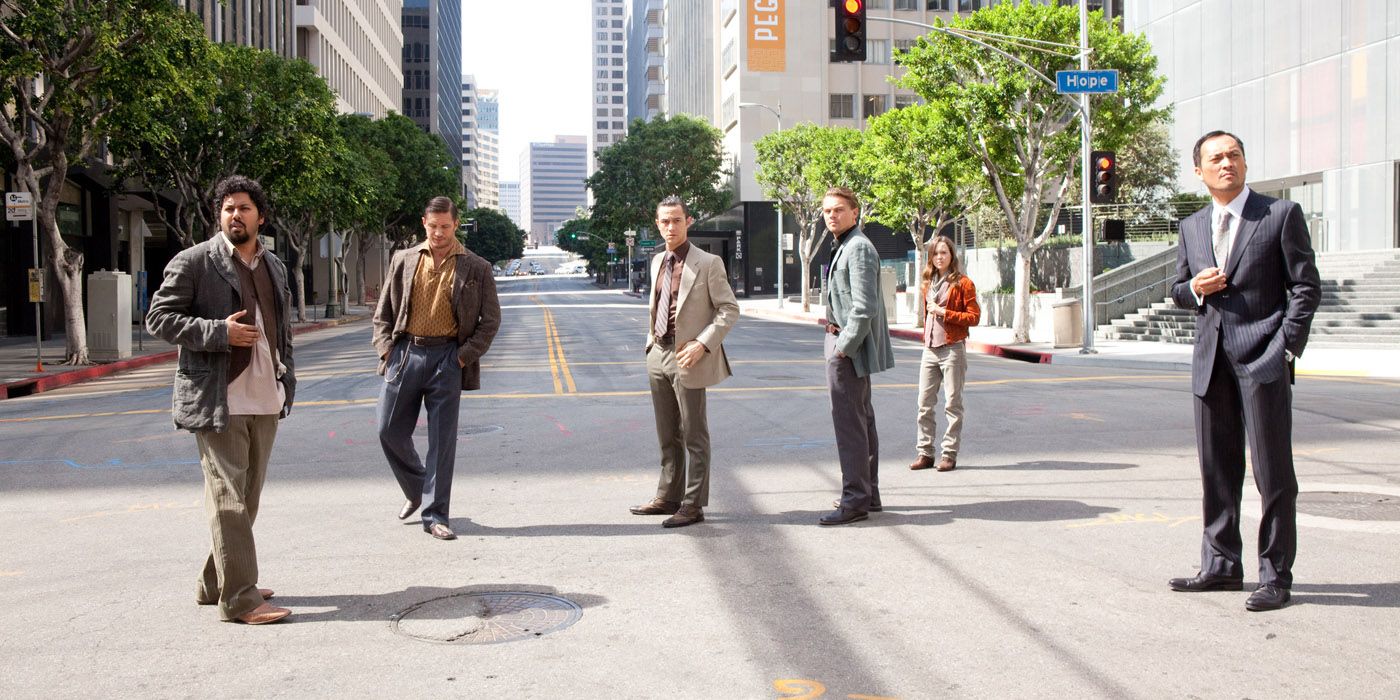 The team standing in the street in Inception (2010)